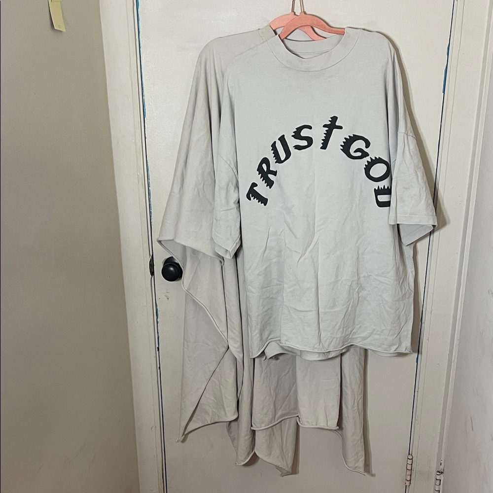 Kanye west Yeezy yzy Sunday service at the mountain  Trust God tee and poncho